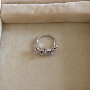 18 Karat white gold diamond ring.