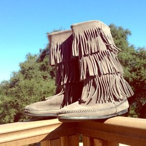 Grey Minnetonka mid-calf fringe boots