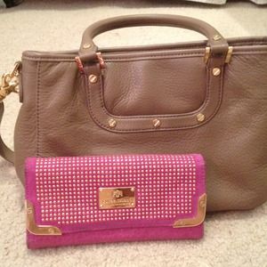 Stylish pink and gold wallet from river island