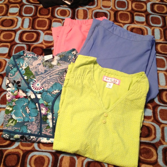 2 scrub tops and 2 scrub bottoms.