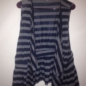A blue and gray stripped vest. Never worn.