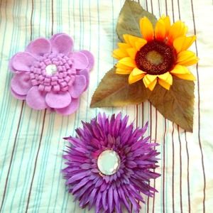 Bundle of three clip on decorative flowers!!