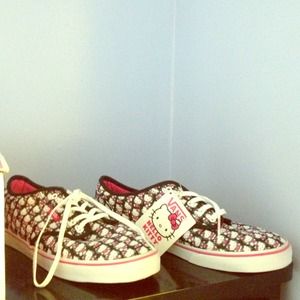 Pink ,White , and black Hello Kitty Vans