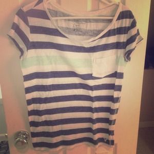 Blue striped shirt with green strip