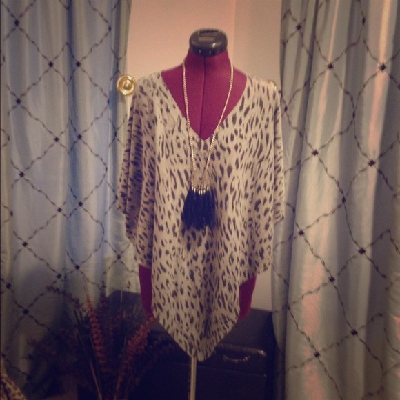 SOLD.  Jealous Tornato grey leopard pullover