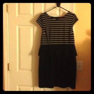 Peplum dress.   Elle