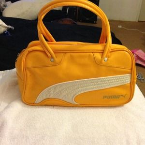 Yellow puma purse