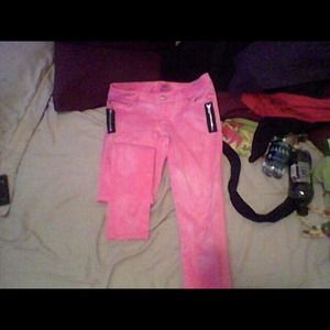 Bright pink skinny jeans