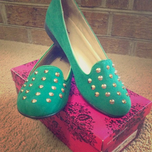 Green studded flats