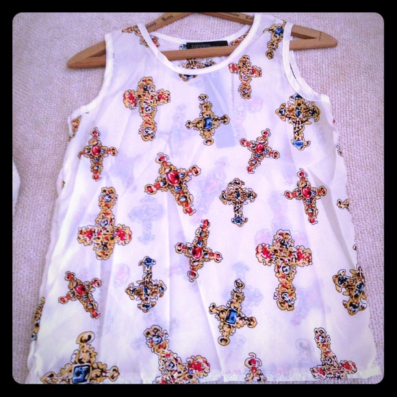 White cross sleeveless shirt blouse