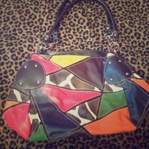 Medium sized purse with different colors and print