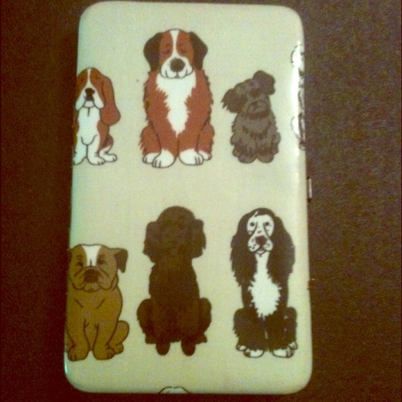 Tan Dog Clasp Wallet.