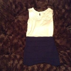White shirt/navy blue mini skirt