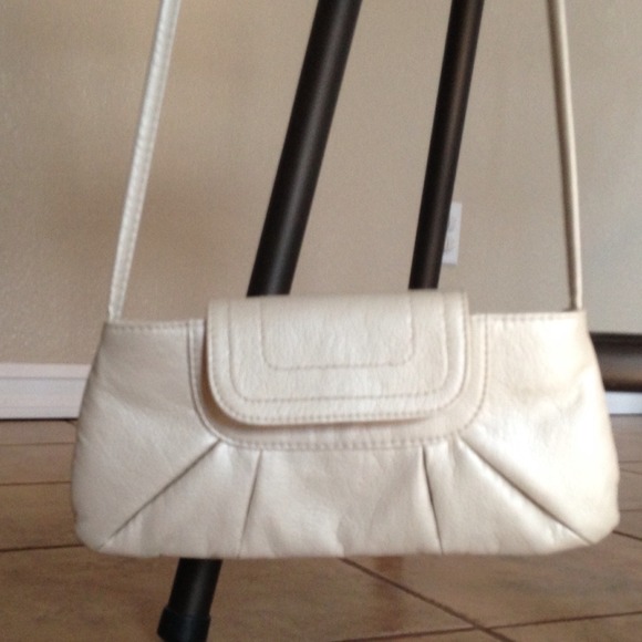 Small pearl colored cross-body purse