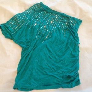Teal one shoulder top with sequin design.