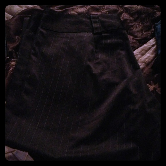 Lightly worn shiny dress pants with stripes