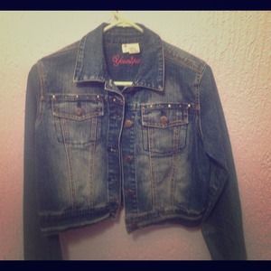 Jean jacket with a butterfly design in the back