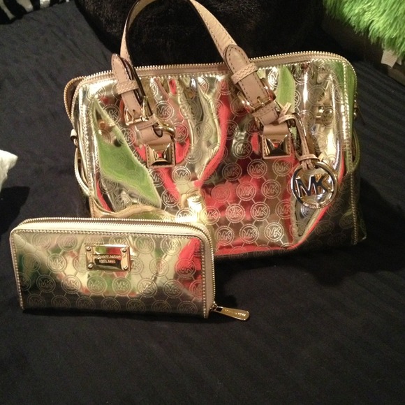 Almost brand new gold MK!