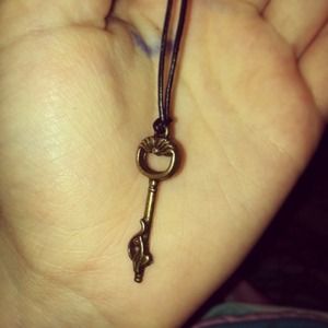 Antique key on leather cord long necklace