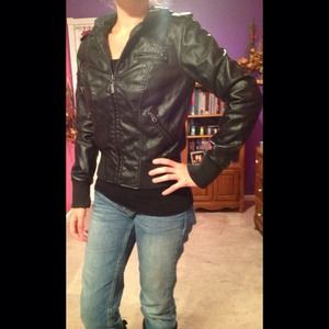 Nollie faux leather jacket with leopard interior.