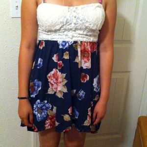 Dark blue dress with a white laced top