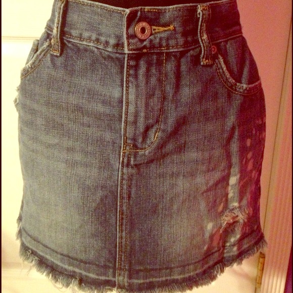Distressed denim skirt.