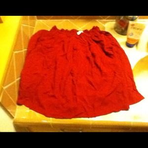 Maroon colored flowy skirt