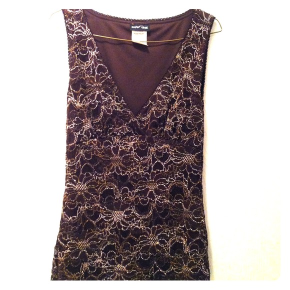 Brown dress shirt with flower design.