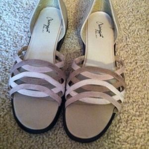 Tan shoes with straps at the top