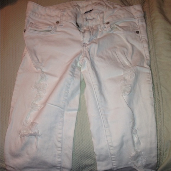 White torn skinny jeans