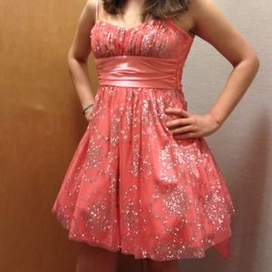 A peach spaghetti strap dress