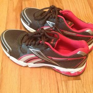 Reebook black, white, and hot pink tennis shoes