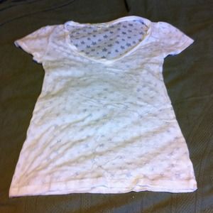 White tee with see thru stars.