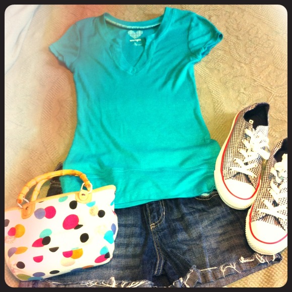 Cute blue-green top. Says L but can fit a S and up