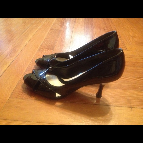 Like new shoes, patented leather black.