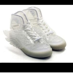 White sneakers with plastic wings