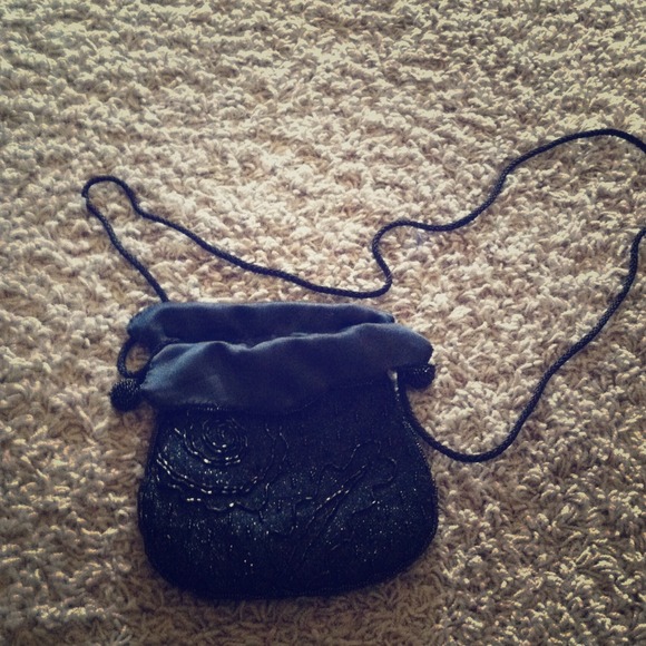 Small black purse with long handle