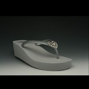 New Twisted Heart flip flops