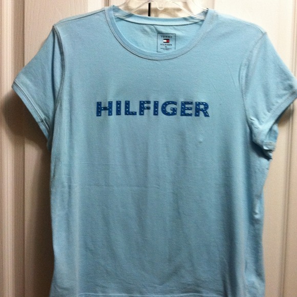 Blue scoop neck shirt.