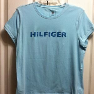 Blue scoop neck shirt.
