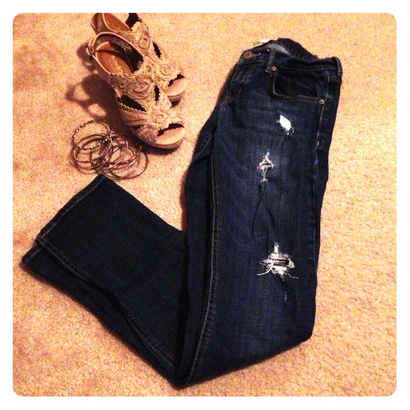 Hollister distressed denim blue jeans.