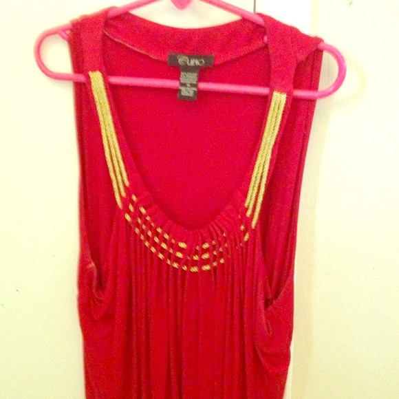Hot red blouse with gold strings in front.