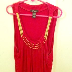 Hot red blouse with gold strings in front.