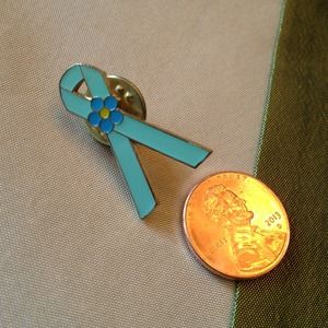 Turquoise ribbon pin