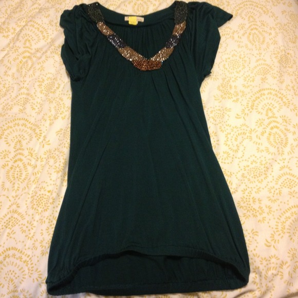 Teal embellishes top