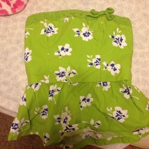 A bright green dress top .