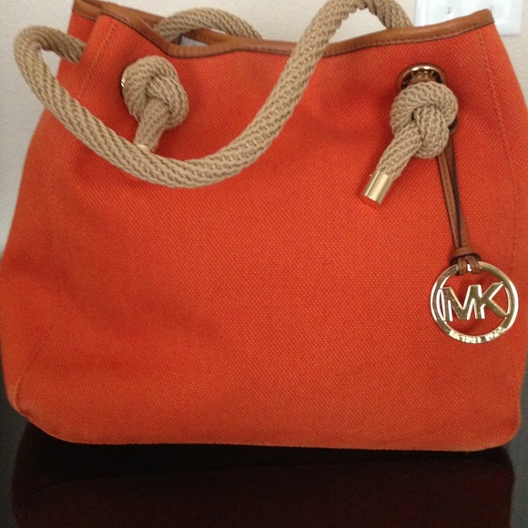 RESERVED!!! Beautiful new Michael Kors Orange