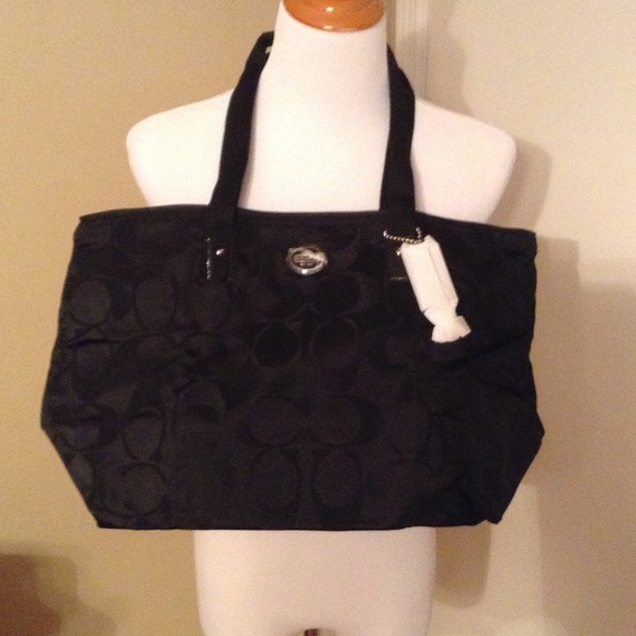 SOLD on EBAY !Black coach packable tote.