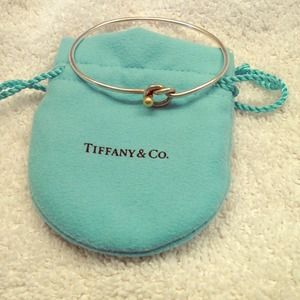 Authentic silver Tiffany knot bracelet gold knot.
