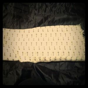 cream colored scarf w/ navy blue heart shaped keys